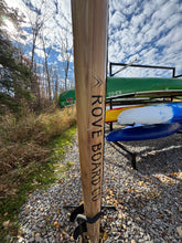 Load image into Gallery viewer, Wooden board with 'ROVE BOARD CO' branding on a gravel path with snow and trees in the background.