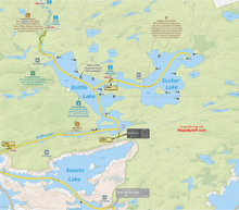 Load image into Gallery viewer, Map of a lakeside area with labeled lakes and roads.